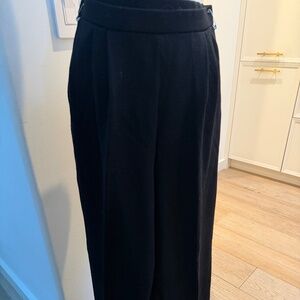 St John classic black knit pull=on pants with pockets.  Size 10